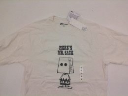 White T-shirt with Here's Mr. print. Sack