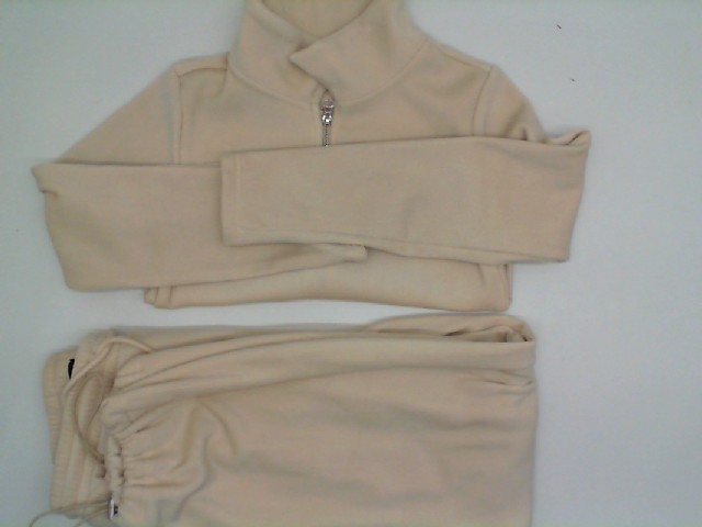 Women's light beige suit: jacket and pants Women's light beige suit: jacket and pants