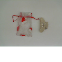 White hair clip with souvenir bag