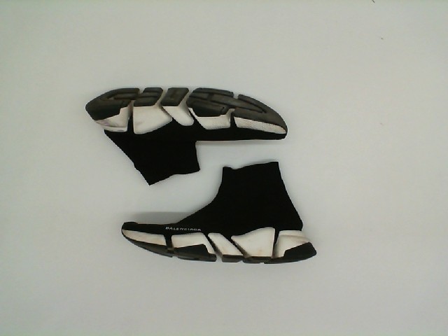 Black sneakers with white soles Black sneakers with white soles