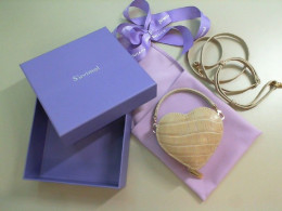 Small leather bag in the shape of a heart, in gift packaging Suvimol Thailand Small leather bag in the shape of a heart, in gift packaging Suvimol Thailand