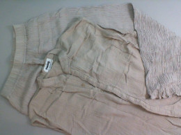 Women's set of sleeveless shirt + pants with elastic band, beige Women's set of sleeveless shirt + pants with elastic band, beige