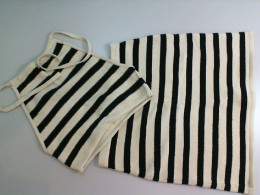 Women's knitted suit skirt + top with ties Women's knitted suit skirt + top with ties