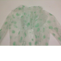Raincoat with leaf print