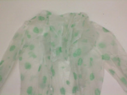 Raincoat with leaf print
