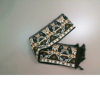 Warm green scarf with a pattern Warm green scarf with a pattern