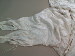 women's dress with straps, white with a train, synthetic