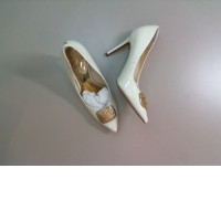 Women's high-heeled white shoes