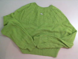 Knitted women's sweater green