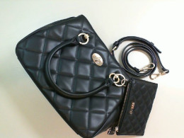 Women's black bag with a small wallet and leatherette