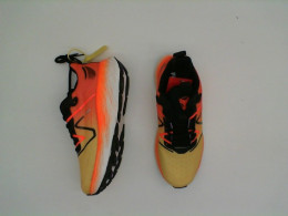 Orange-yellow sports shoes Orange-yellow sports shoes