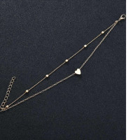 Women's accessory in the form of a chain on the leg