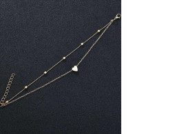 Women's accessory in the form of a chain on the leg