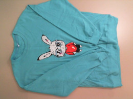 Blue jacket with long sleeves, with a bunny