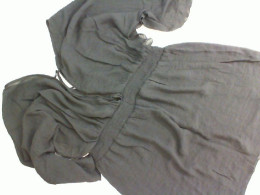 Short black dress with a large neckline Short black dress with a large neckline