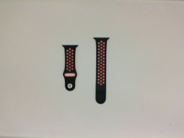 Black and orange silicone strap for Apple Watch