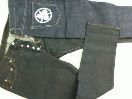 Men's black jeans, with a white flower on the back pocket, high waist