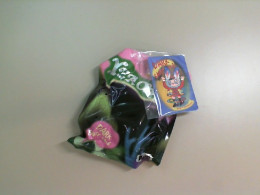 Wrapped collectible toy + magnet Wrapped collectible toy + magnet