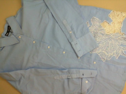 Women's blue shirt with lace