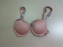 Pink bra with sequins on the straps