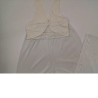 Suit: white vest and long wide pants