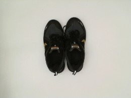 sports shoes black glod sports shoes black glod