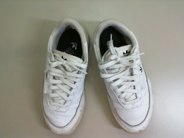 Women's white Adidas sneakers