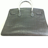 Women's leather bag, with long strap included