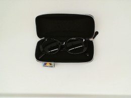glasses in a black box 