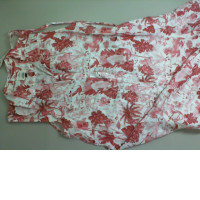 Sleeveless button down dress, white with red designs Sleeveless button down dress, white with red designs