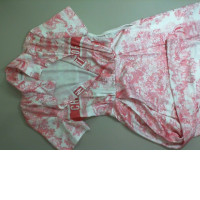 Short sleeve dress with buttons, white with red patterns Short sleeve dress with buttons, white with red patterns