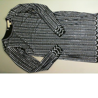 Black short dress, decorated with sequins, long sleeve Black short dress, decorated with sequins, long sleeve