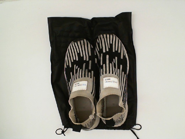 sneakers white&black in a black bag sneakers white&black in a black bag