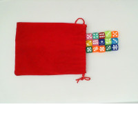 multi-colored dice in a rad bag 