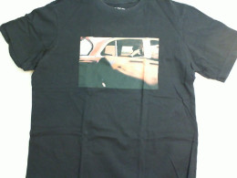 Black T-shirt with sticker