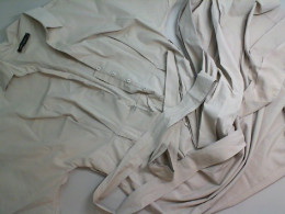 Long beige dress with buttons and belt