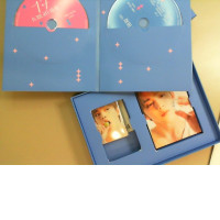 Album with photos of a Korean music group + CD