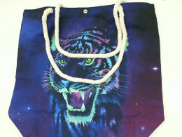 Black cloth bag with blue pattern 