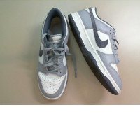 Gray and white Nike sneakers