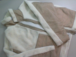 Warm beige jacket with zipper Warm beige jacket with zipper