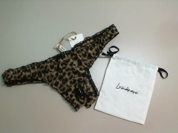 Women's underwear leopard color in a gift bag