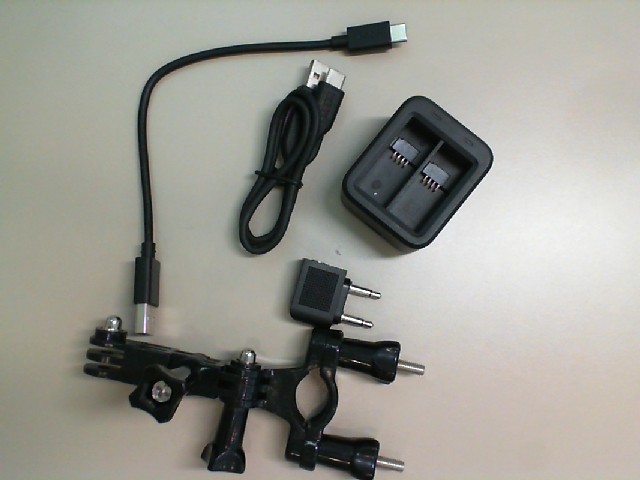 Set for GoPro camera. Battery charging adapter + 2 cables, camera clamp Set for GoPro camera. Battery charging adapter + 2 cables, camera clamp