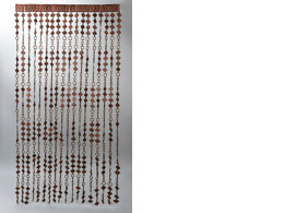 Curtain made of wooden beads on the doorway Curtain made of wooden beads on the doorway