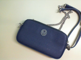 Blue bag with a long strap