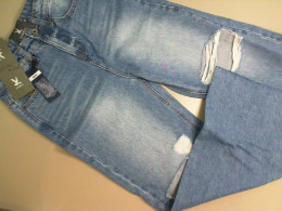 Women's jeans with ripped knees Women's jeans with ripped knees