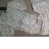 Dress, long, white with multi-colored patterns Dress, long, white with multi-colored patterns