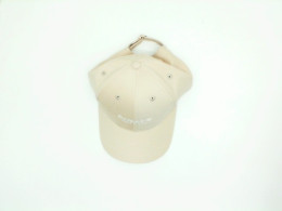 Beige cap with ZeeNuNew Be Closer print
