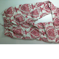 Light-colored pants with a red pattern