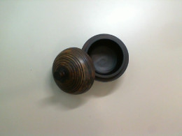 Wooden vase with lid