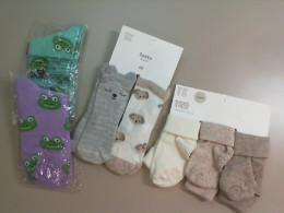 A set of socks for a child 0.6-0.8 months, 2 colored tights, 7 pairs of light socks